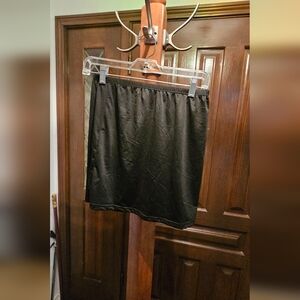 PACKAGE OF 3 SHORT SLIPS. BLACK, WHITE AND BEIGE SOLD AS A SET.